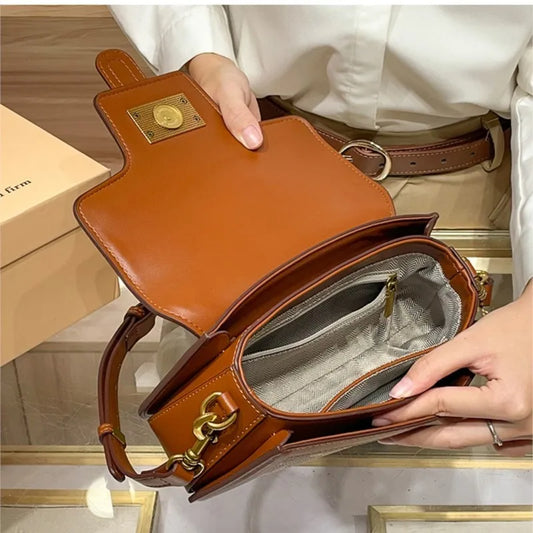 Light luxury niche design contrasting color saddle bag 2025 new high-end handbag versatile single shoulder crossbody bag