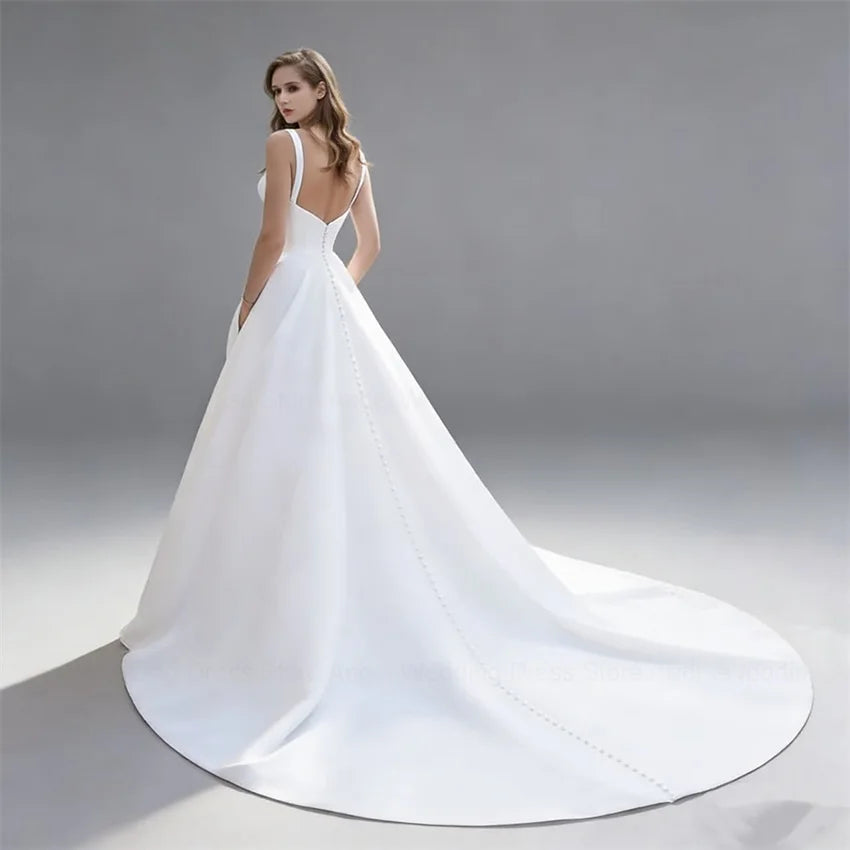Customized Elegant V-Neck Wedding Dress Long Satin Bridal Gown A-line Backless Buttons Spaghetti Straps Bride Dress with Pockets