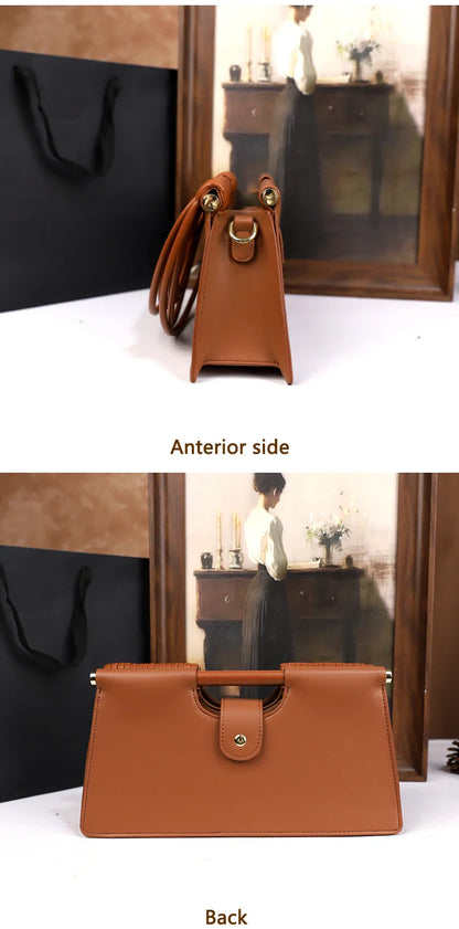 The 2025 new hand-held woven bag with lines is a unique, high-end, individual and fashionable handbag for women