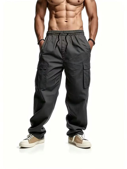 Men's casual multi pocket work pants with loose fit and drawstring waistband suitable for hikingfishingand outdoor exploration