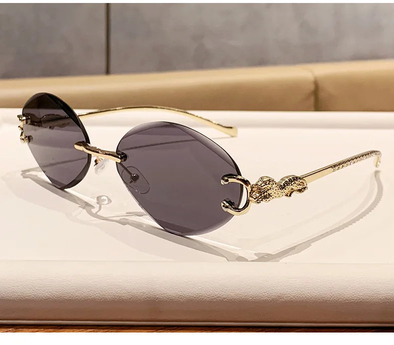 2026 New Fashion Leopard Head Frameless Oval Sunglasses Women Men Internet Celebrity Female Sunscreen Sun Glasses High-end UV400