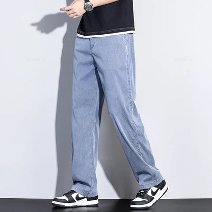 Brand Clothing Summer New Soft Lyocell Fabric Jeans Men Blue Elastic Waist Loose Straight Thin Denim Trousers Male Plus Size 5XL