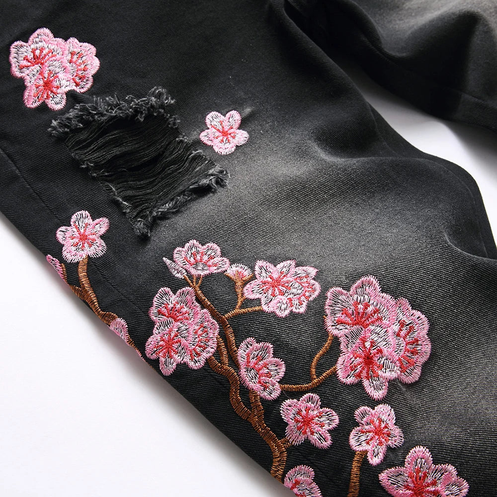 Men Sakura Embroidery Denim Jeans Streetwear Boot Cut Pants Released Hem Flared Trousers with Ripped And Cherry Blossom Design
