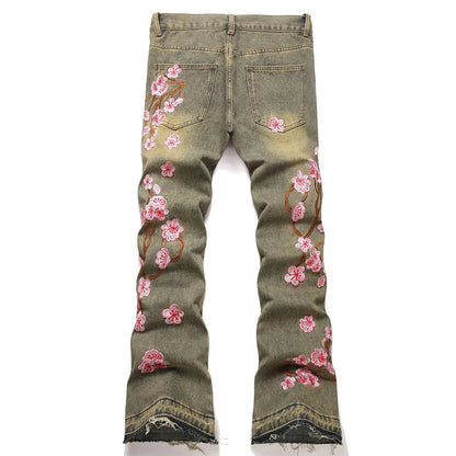 Men Sakura Embroidery Denim Jeans Streetwear Boot Cut Pants Released Hem Flared Trousers with Ripped And Cherry Blossom Design