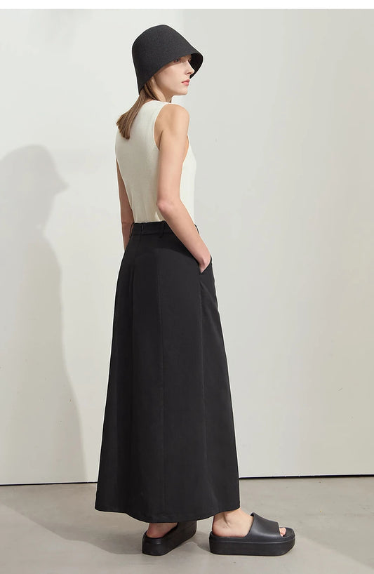 تنورة طويلة نسائية جديدة من Amii Minimalism لربيع وصيف 2025، سوداء مطوية أنيقة، مناسبة للمكتب والعمل، فضفاضة، موديل 12542102