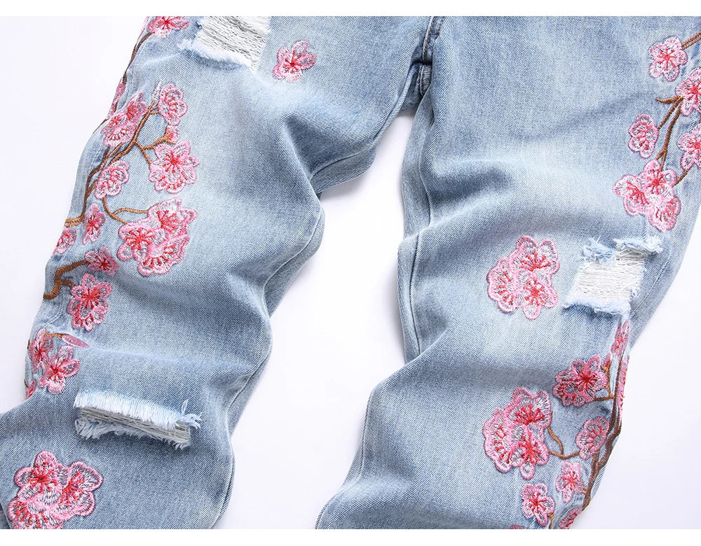Men Sakura Embroidery Denim Jeans Streetwear Boot Cut Pants Released Hem Flared Trousers with Ripped And Cherry Blossom Design