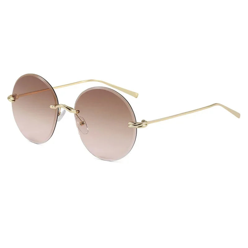 2026 New Fashion rimless circle frame sunglasses for women new alloy oversize gradient knot sun glasses ladies sexy shades uv400
