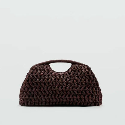 Seaside vacation style grass woven bag, spring and summer new style, European and American high-end feeling, hand-held gold clip