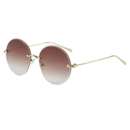 2026 New Fashion rimless circle frame sunglasses for women new alloy oversize gradient knot sun glasses ladies sexy shades uv400