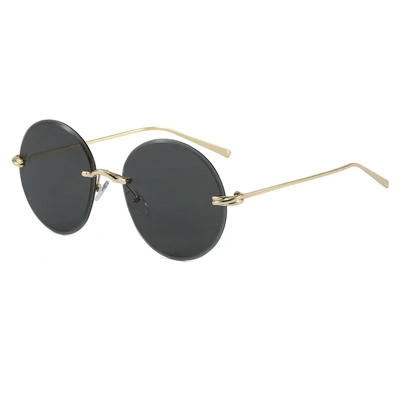 2026 New Fashion rimless circle frame sunglasses for women new alloy oversize gradient knot sun glasses ladies sexy shades uv400