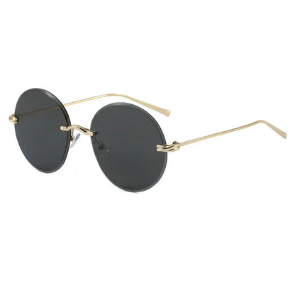 2026 New Fashion rimless circle frame sunglasses for women new alloy oversize gradient knot sun glasses ladies sexy shades uv400