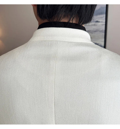 The new Chinese-style collarless suit is fashionable, handsome and versatile. It is a solid-color Korean-style fitted and fashio
