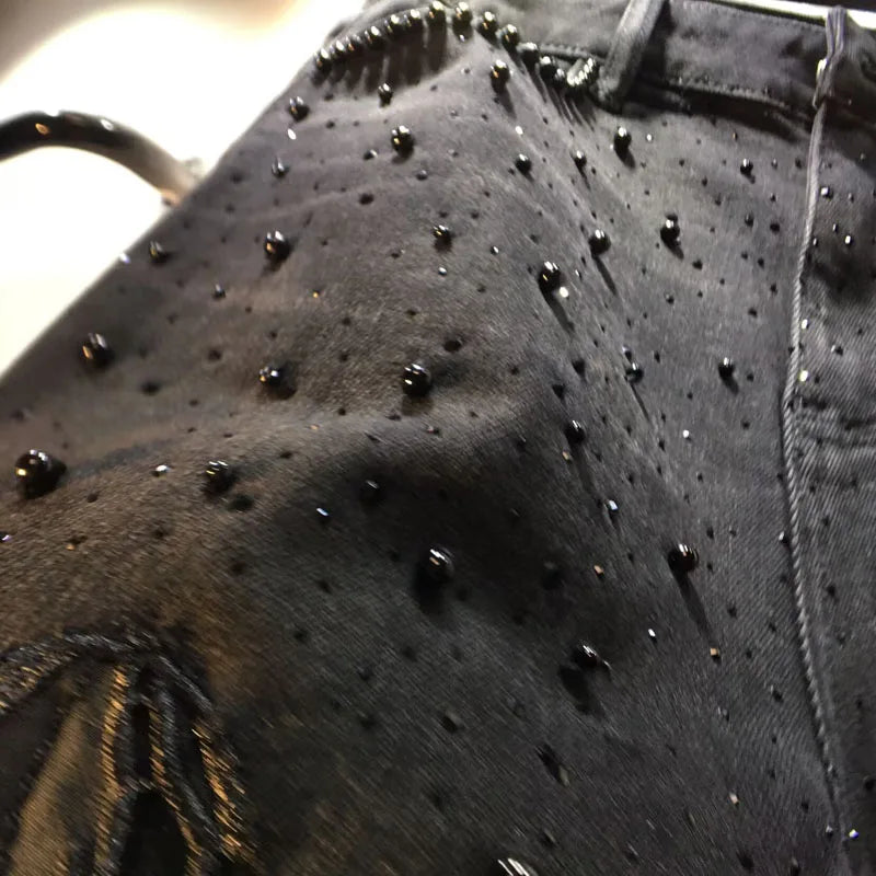 European 2025 Hollow Lace Jeans Women Summer New Black Lace Denim Pants Heavy Industry Beads Hot Diamond Denim Splicing Crochet