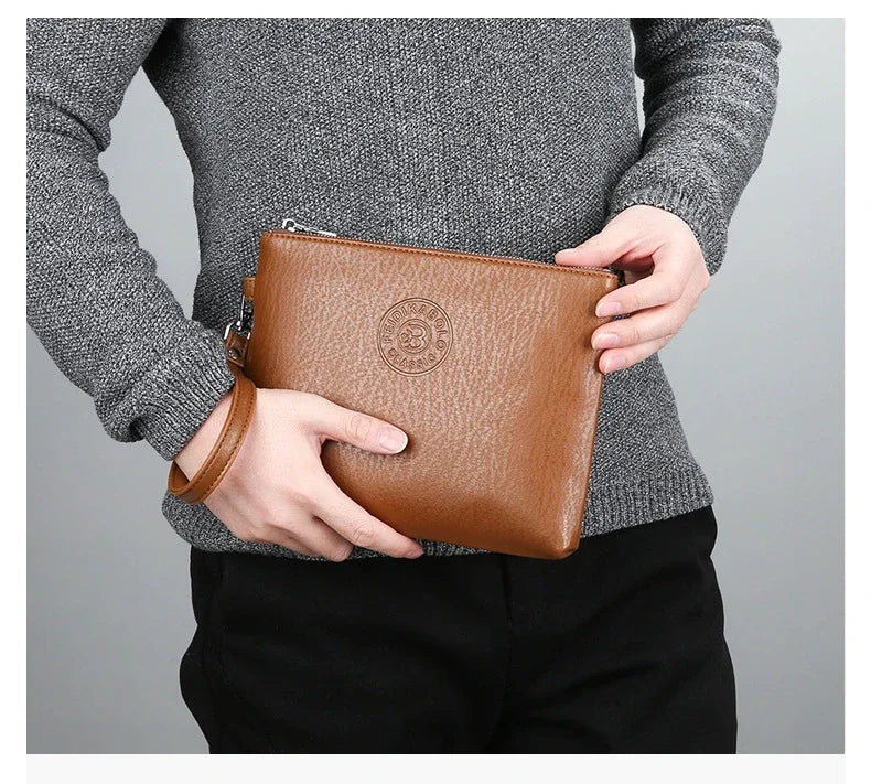 Nouvelle Pochette pour Homme Style Business Grand Portefeuille en Cuir PU Souple Homme avec Dragonne Sac Élégant Décontracté et Tendance Sac à Main Pochette Homme