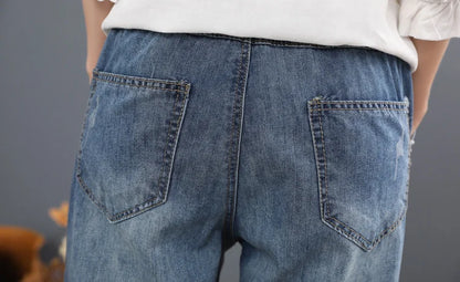 2025 Chinese Summer Fashion Ladies Vintage Embroidery Jeans Women Casual Floral Denim Trousers Ripped Harem Pantalons