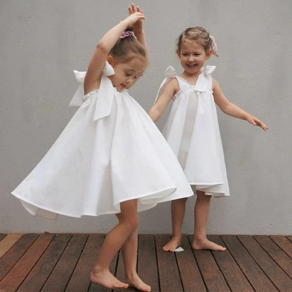 Summer Girl's Bow Tie Shoulder Straps 100% Cotton White Dress 2026 New Flower Girl Loose Vacation Party Princess Dresses