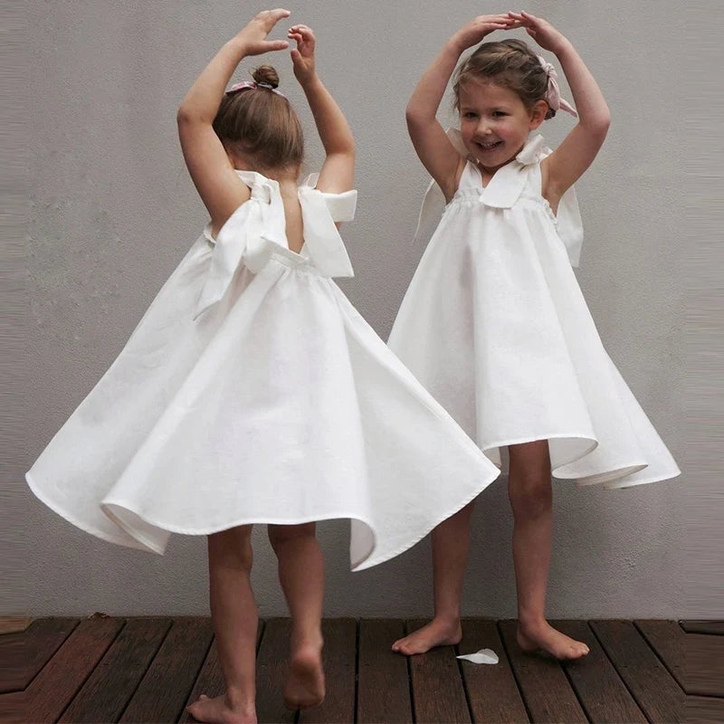 Summer Girl's Bow Tie Shoulder Straps 100% Cotton White Dress 2026 New Flower Girl Loose Vacation Party Princess Dresses