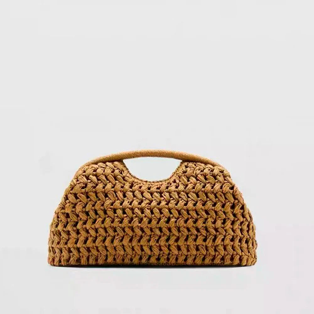 Seaside vacation style grass woven bag, spring and summer new style, European and American high-end feeling, hand-held gold clip