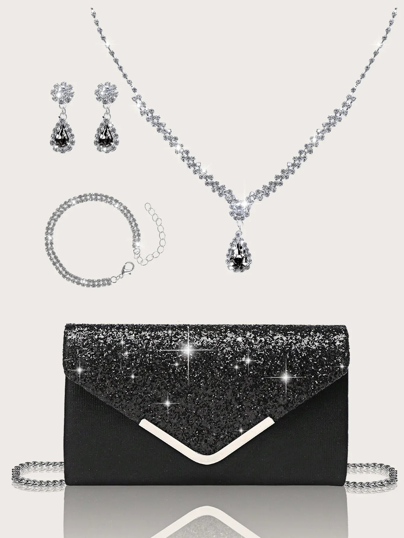 Gorgeous and elegant sparkly women's clutch bag, paired with a gorgeous rhinestone necklace, earrings and bracelet set of four.