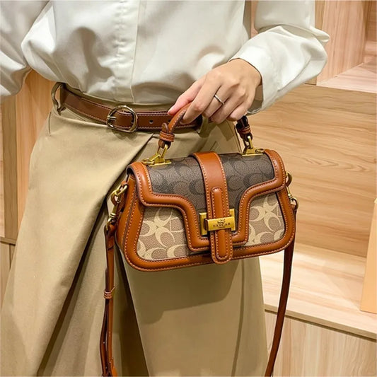 Light luxury niche design contrasting color saddle bag 2025 new high-end handbag versatile single shoulder crossbody bag