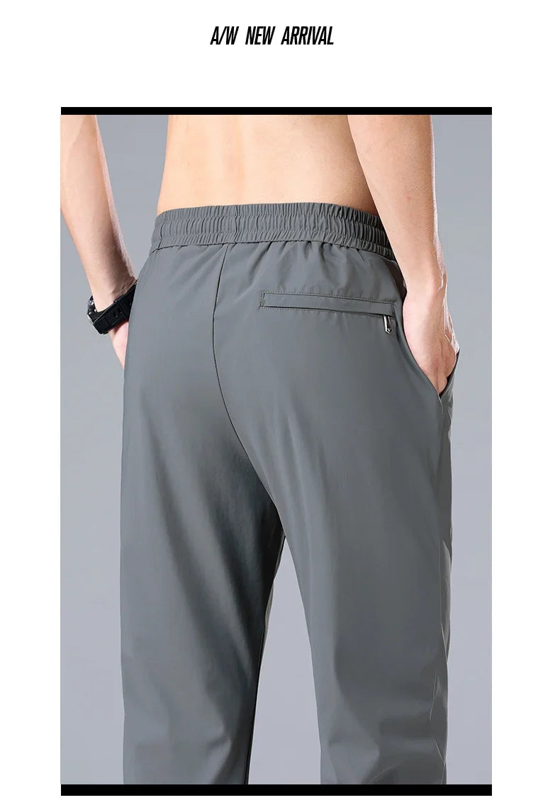 High Quality Ice Silk Stretch New Brand Casual Fashion Elastic Strappy Long Pants Street Style Pencil Teens Trousers Men Clothes