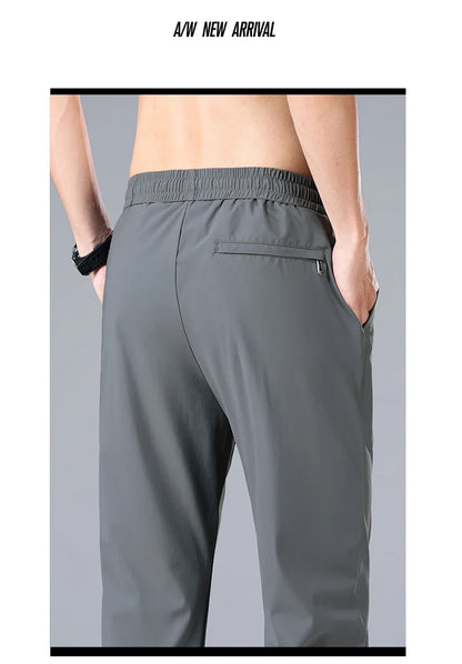 High Quality Ice Silk Stretch New Brand Casual Fashion Elastic Strappy Long Pants Street Style Pencil Teens Trousers Men Clothes