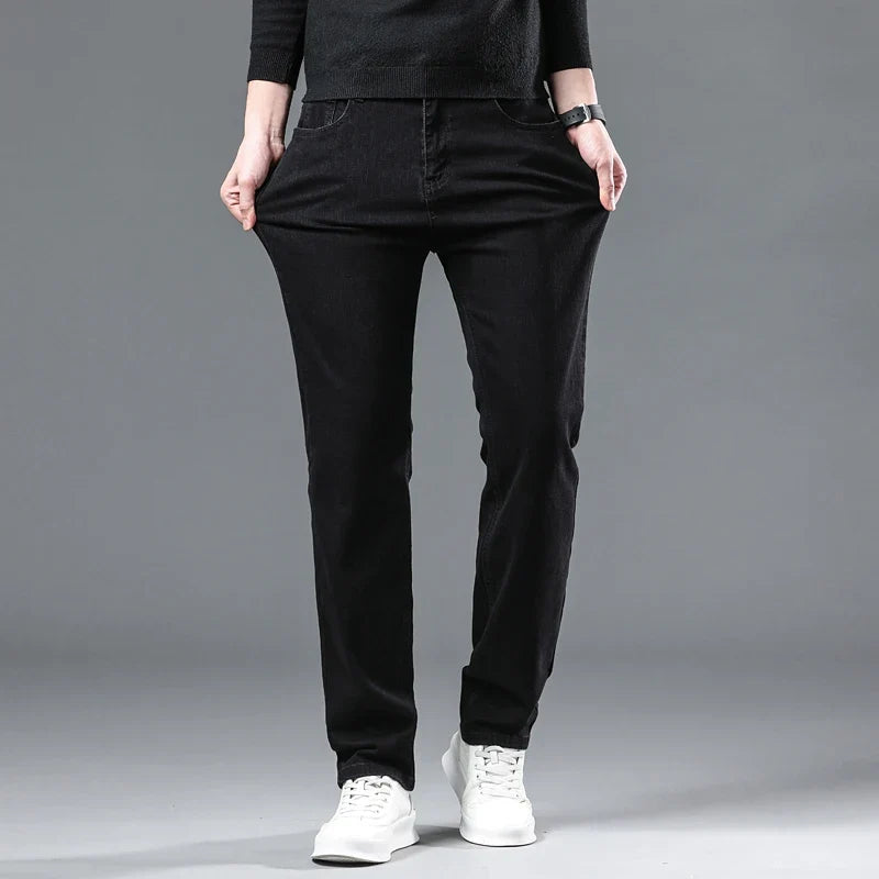 2025 New Winter Pure Black Fleece Thick Warm Jeans Men's loose Straight Elastic Denim Pants classics Casual Plush Trousers