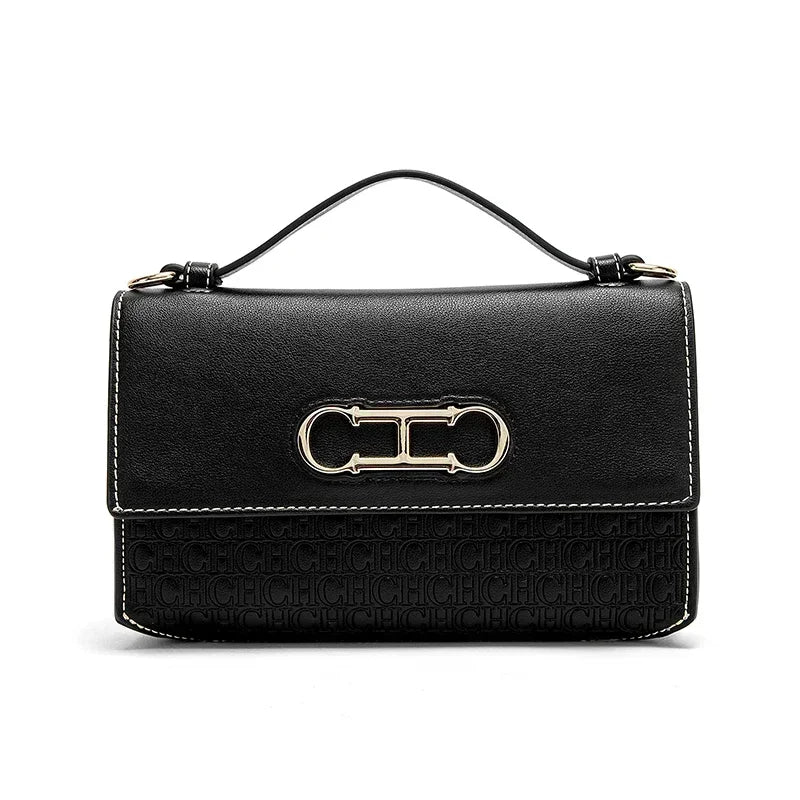 Premium Leather Handbag Monogram Embossing Metallic Clasp Portable Handle Structured Silhouette Ideal Office Evening Events