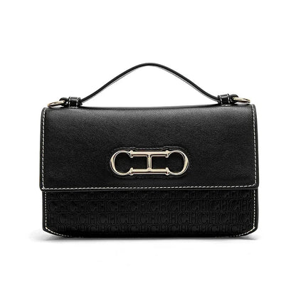 Premium Leather Handbag Monogram Embossing Metallic Clasp Portable Handle Structured Silhouette Ideal Office Evening Events