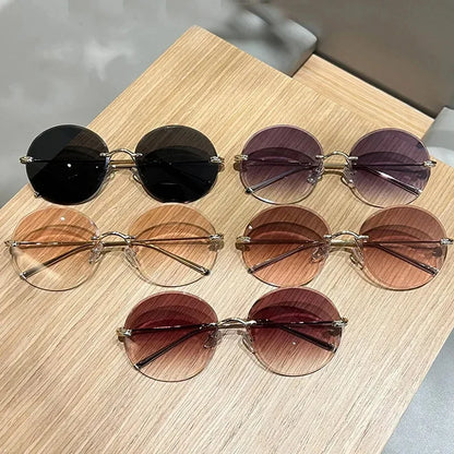 2026 New Fashion rimless circle frame sunglasses for women new alloy oversize gradient knot sun glasses ladies sexy shades uv400