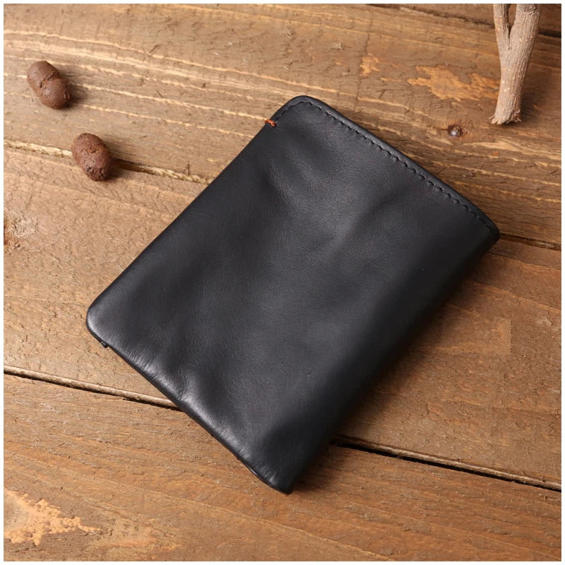 Portefeuille en cuir de vachette couche supérieure Portefeuille en cuir véritable souple Porte-cartes de crédit pour hommes Sac à main de luxe Noir Élégant Simple Portefeuilles pour hommes