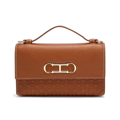 Premium Leather Handbag Monogram Embossing Metallic Clasp Portable Handle Structured Silhouette Ideal Office Evening Events