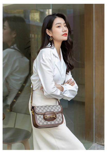 Ladies genuine leather saddle bag, single shoulder bag underarm bag, new fashion versatile niche trend crossbody bag.