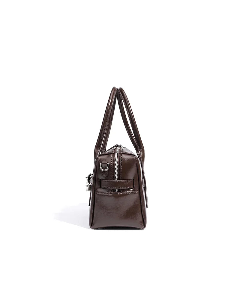 2025 Fall Winter New Top Grain Leather Spacious Boston Bag Lock Design Single Shoulder Crossbody Pack Women Commuting Handbag