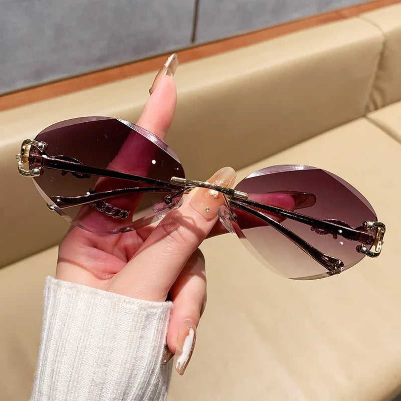 2026 New Fashion Leopard Head Frameless Oval Sunglasses Women Men Internet Celebrity Female Sunscreen Sun Glasses High-end UV400