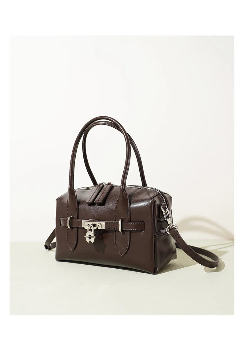 2025 Fall Winter New Top Grain Leather Spacious Boston Bag Lock Design Single Shoulder Crossbody Pack Women Commuting Handbag