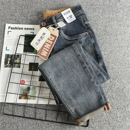 Retro blue wash-fried cat whisker jeans men's high-end custom fabric American fashion brand youth nine-point pants