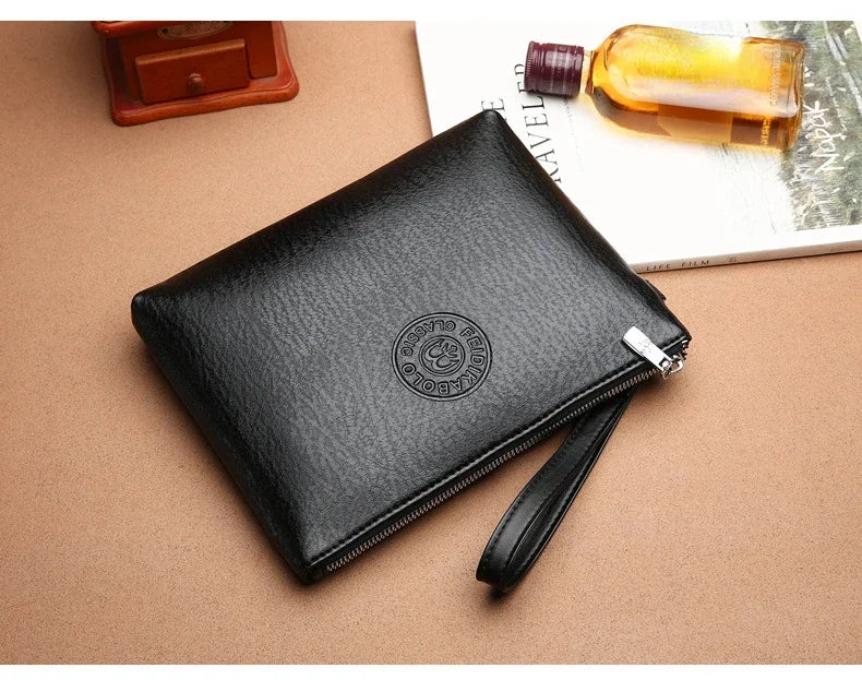 Nouvelle Pochette pour Homme Style Business Grand Portefeuille en Cuir PU Souple Homme avec Dragonne Sac Élégant Décontracté et Tendance Sac à Main Pochette Homme