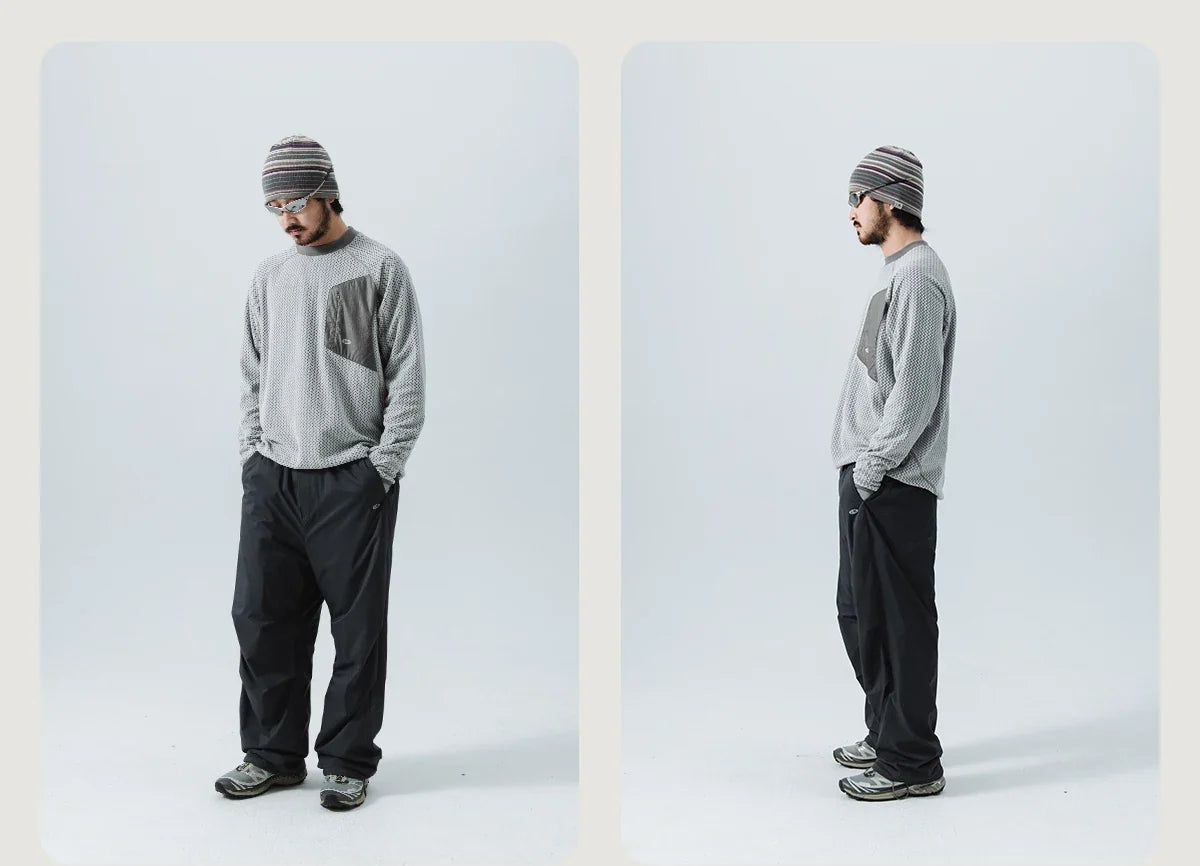 Mountain-Ready Crewneck: Engineered with Ribbed Neck, Reflective Logo, & Secure Chest Pocket for Outdoor Style Unisex