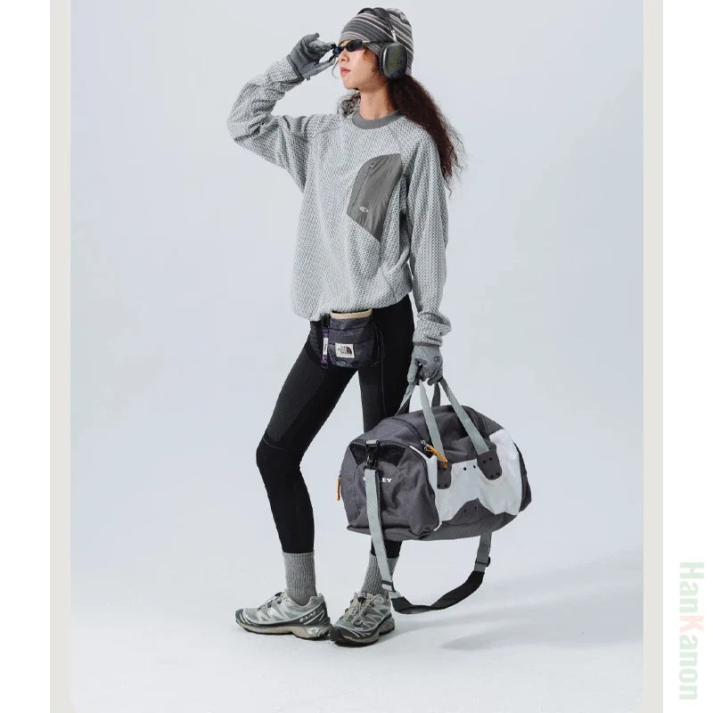 Mountain-Ready Crewneck: Engineered with Ribbed Neck, Reflective Logo, & Secure Chest Pocket for Outdoor Style Unisex