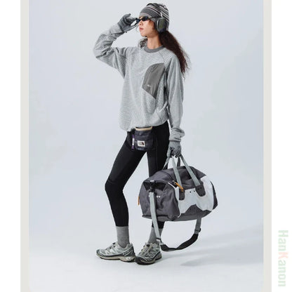 Mountain-Ready Crewneck: Engineered with Ribbed Neck, Reflective Logo, & Secure Chest Pocket for Outdoor Style Unisex