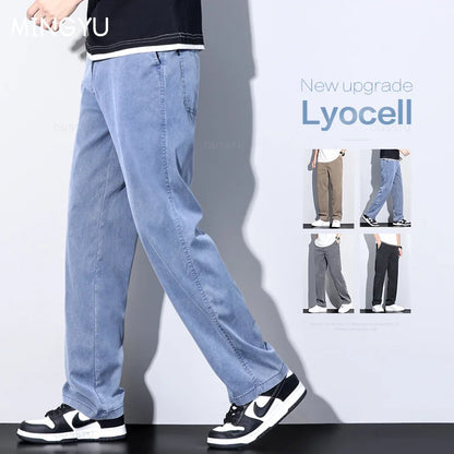 Brand Clothing Summer New Soft Lyocell Fabric Jeans Men Blue Elastic Waist Loose Straight Thin Denim Trousers Male Plus Size 5XL