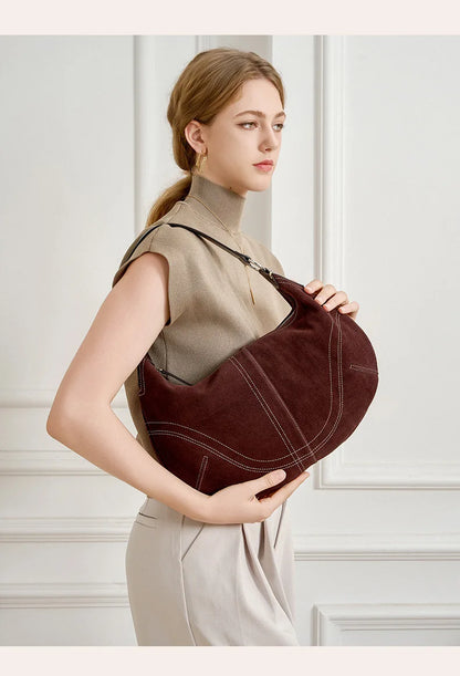 2025 Fall Winter New Top Grain Leather Spacious Boston Bag Lock Design Single Shoulder Crossbody Pack Women Commuting Handbag
