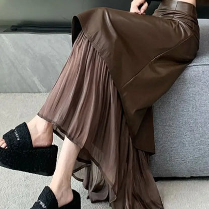 تنورة نسائية ريترو، تنورة طويلة بخصر عالٍ وقصة A-line بتصميم جديد للخريف المبكر من الجلد بخياطة غير متماثلة