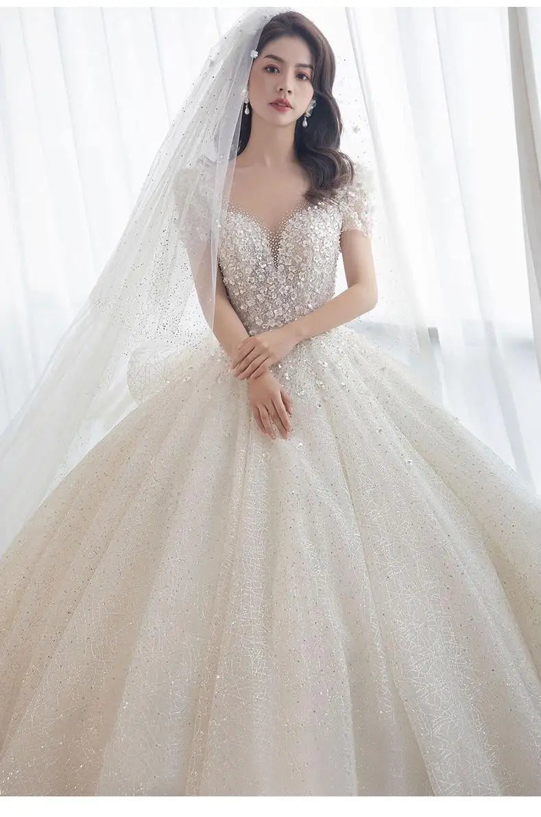 Luxury Short Sleeve Wedding Dress 2026 New Bridal Dress V Neck Beading Shinning Ball Gown Sweep Train Vestido  Noiva Customized