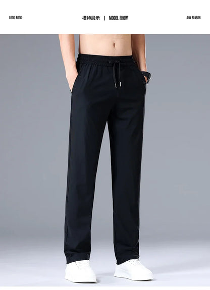 High Quality Ice Silk Stretch New Brand Casual Fashion Elastic Strappy Long Pants Street Style Pencil Teens Trousers Men Clothes