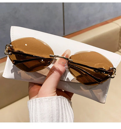 2026 New Fashion Leopard Head Frameless Oval Sunglasses Women Men Internet Celebrity Female Sunscreen Sun Glasses High-end UV400
