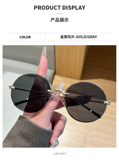 2026 New Fashion rimless circle frame sunglasses for women new alloy oversize gradient knot sun glasses ladies sexy shades uv400
