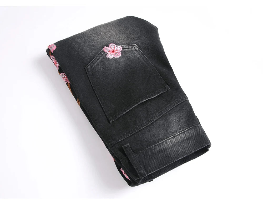 Men Sakura Embroidery Denim Jeans Streetwear Boot Cut Pants Released Hem Flared Trousers with Ripped And Cherry Blossom Design