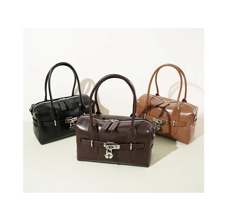 2025 Fall Winter New Top Grain Leather Spacious Boston Bag Lock Design Single Shoulder Crossbody Pack Women Commuting Handbag